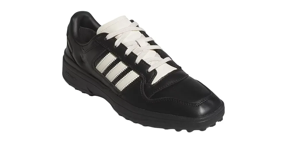 Chaussure noire avec bandes blanches