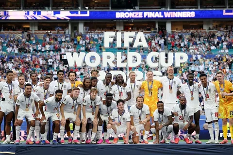 Équipe célébrant dans un stade avec le texte FIFA World Cup 2022.