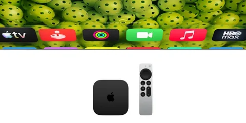 Écran d'Apple TV avec télécommande et applications affichées.