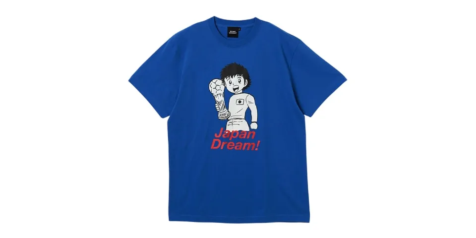 T-shirt bleu avec personnage de dessin animé et texte 'Japan Dream'.