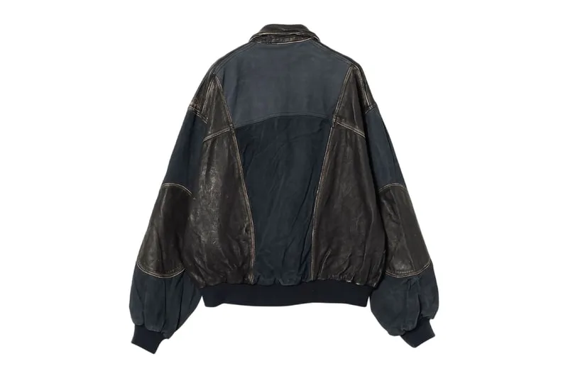 Veste en cuir et tissu avec coutures contrastées, vue de dos.