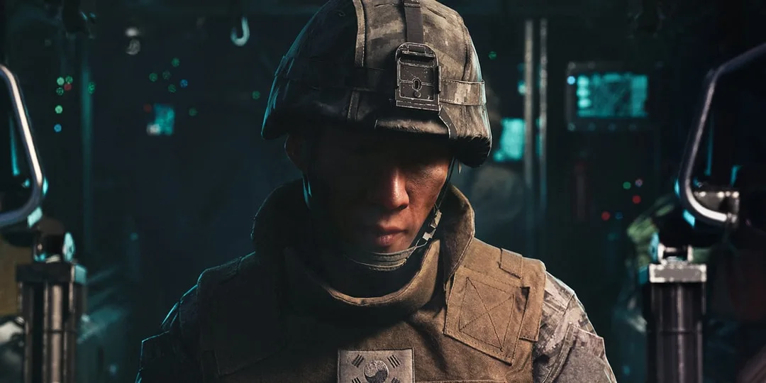 Soldat en uniforme militaire dans un intérieur sombre et éclairé