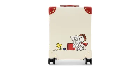 Valise blanche avec Snoopy, Woodstock et carte.