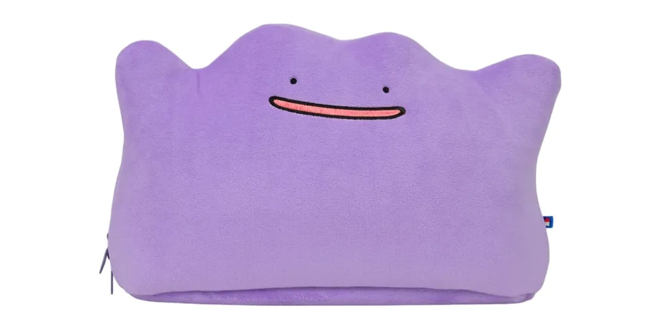 Peluche violette avec un visage souriant simple