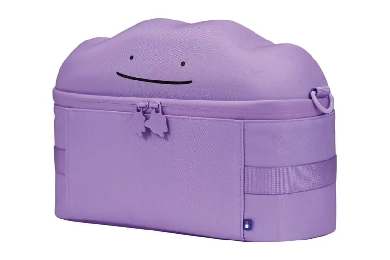 Sac violet en forme de nuage avec visage souriant.