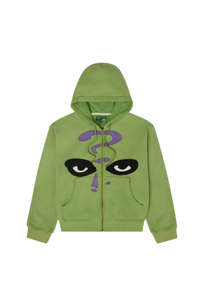 Sweat-shirt vert avec un point d'interrogation et des yeux noirs.