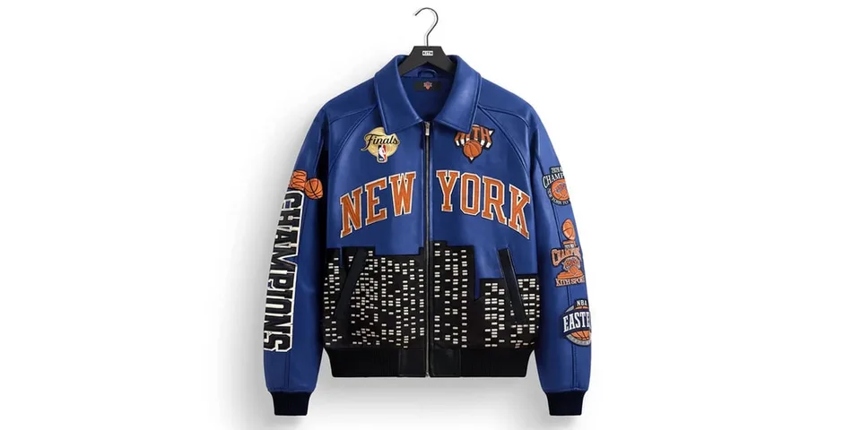 Veste bleue New York avec détails de basket et skyline.