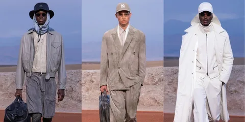 Défilé de mode avec trois hommes en vêtements élégants et modernes.