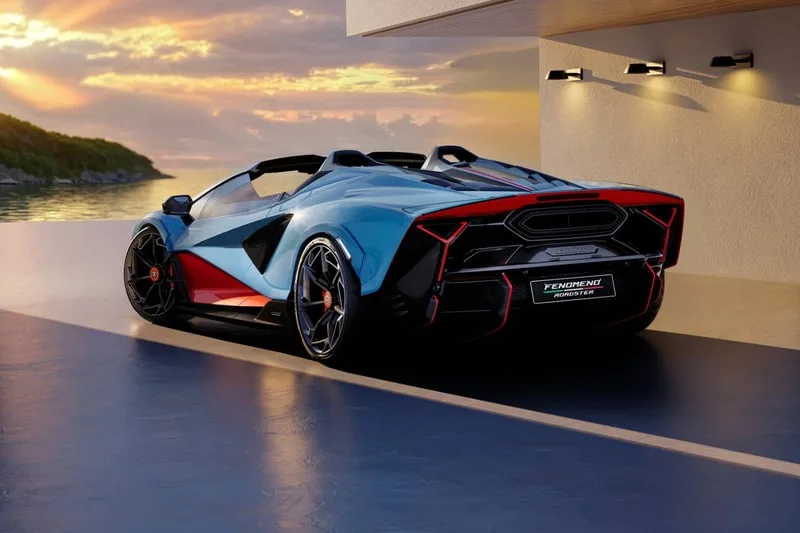 Voiture de sport exotique au bord de l'eau, au coucher du soleil.
