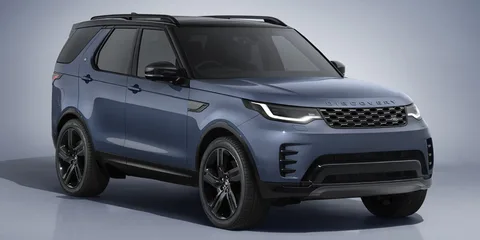 SUV bleu moderne avec des roues noires et toit panoramique.