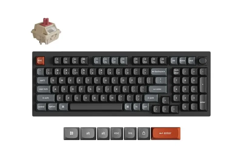 Clavier mécanique noir avec touches rouges et grises et interrupteur mécanique rouge.