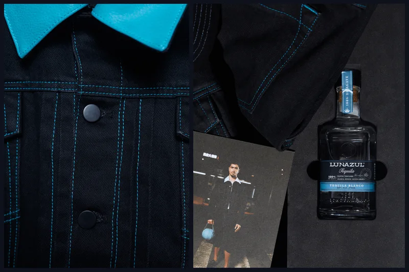 Veste noire avec col bleu et bouteille de tequila Lunazul.