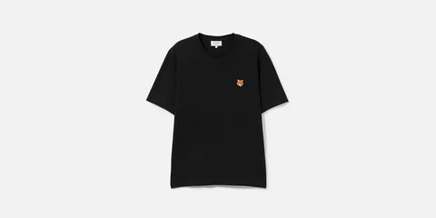 T-shirt noir à manches courtes avec un petit motif orange sur la poitrine