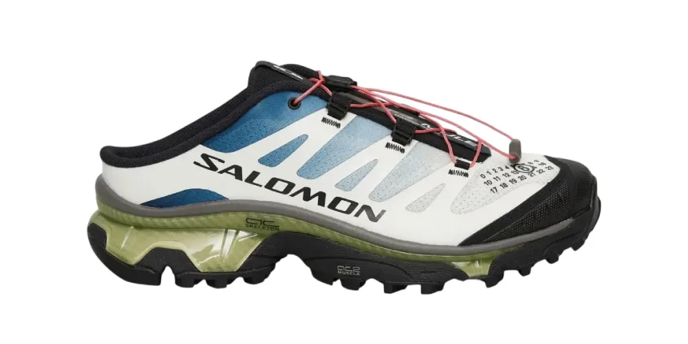 Chaussure Salomon avec design moderne et semelle épaisse.