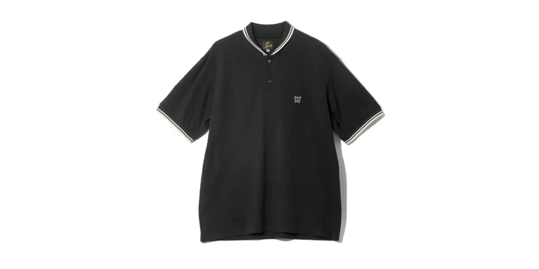 Polo noir à manches courtes avec col et liseré contrastant