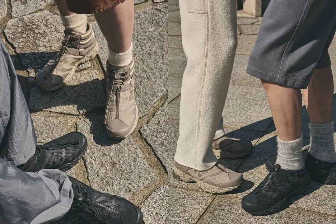 Groupe de randonneurs en chaussures de marche sur un chemin pavé