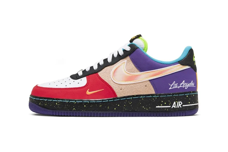 Chaussure multicolore avec texte 'Los Angeles', swoosh doré, semelle noire.