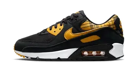 Chaussure de sport noire et jaune avec motif à carreaux