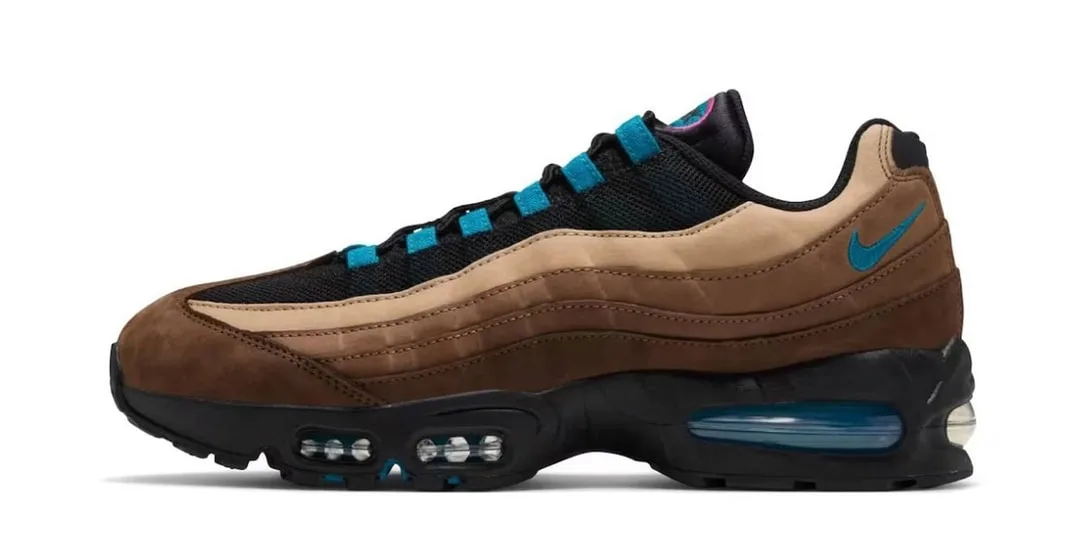 Chaussure Nike Air Max 95 avec des tons marron et accents bleus.