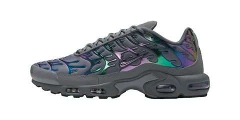 Chaussure de sport grise avec détails irisés et semelle à bulles d'air.
