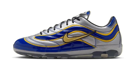 Baskets Nike, bleu et jaune, style sportif moderne.