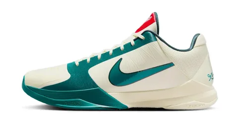 Chaussure de sport blanche et verte avec logo Nike.