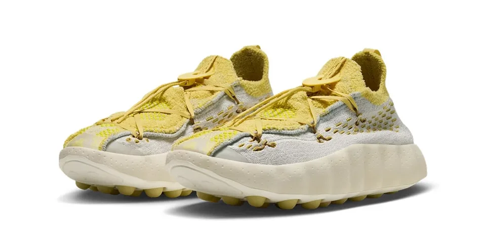 Chaussures jaunes et grises au design moderne et épais.