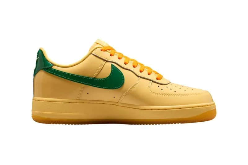 Basket jaune avec logo vert et détails orange, semelle marron clair.