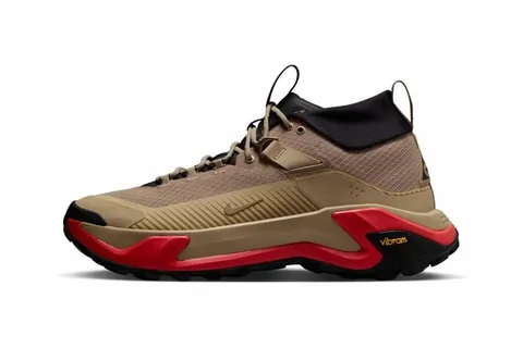 Chaussure de randonnée beige avec semelle rouge et noire.