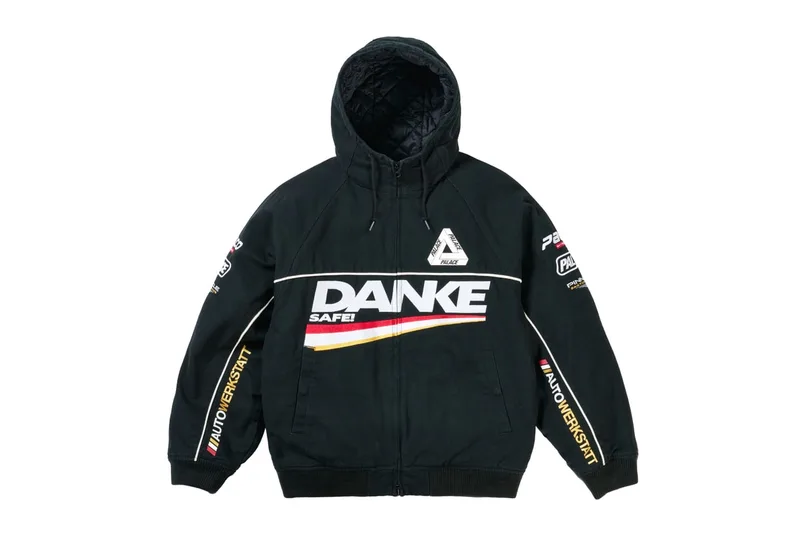 Veste noire avec inscriptions 'DANKE' et logos variés.