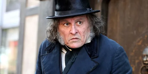 Homme en costume ancien et chapeau haut de forme, air étonné.