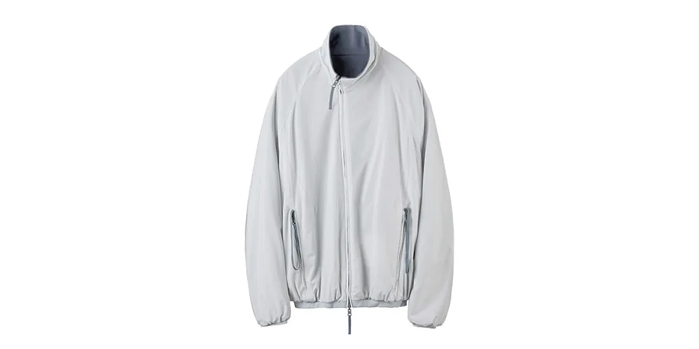 Veste grise avec fermeture éclair et poches, col haut