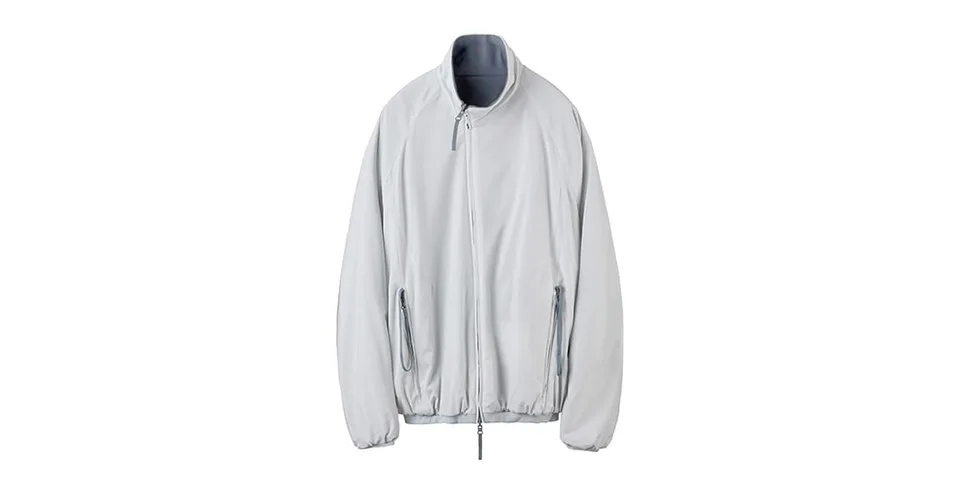 Veste grise avec fermeture éclair et poches, col haut