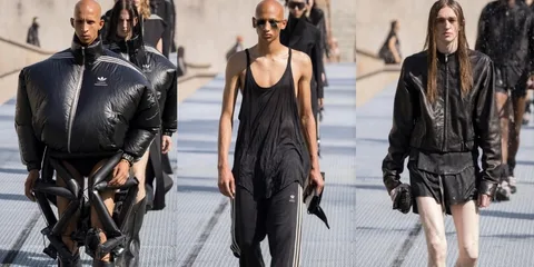 Défilé de mode avec vêtements sombres et modernes, style unique.