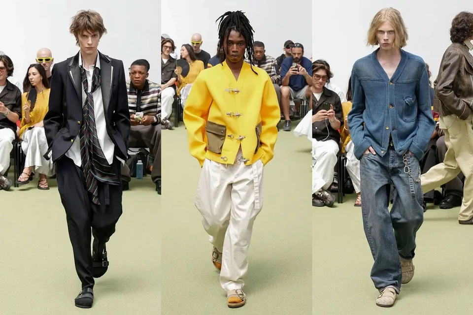 Défilé de mode avec tenues élégantes et stylées hommes.