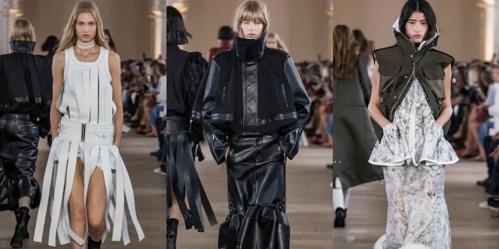 Défilé de mode avec mannequins portant des tenues avant-gardistes.