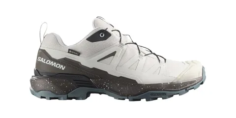 Chaussure de randonnée Salomon blanche et noire avec semelle résistante