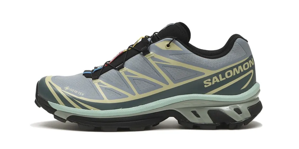 Chaussure de course Salomon avec design moderne et semelle robuste.