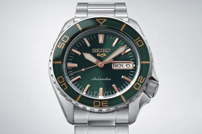 Montre Seiko argentée avec cadran vert et indicateurs dorés