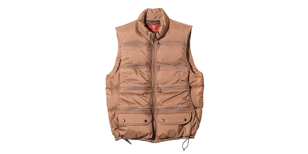 Veste sans manches matelassée marron avec poches zippées