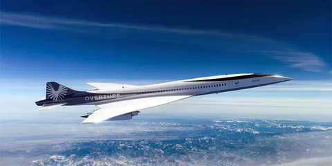Avion supersonique Overture en vol au-dessus des montagnes