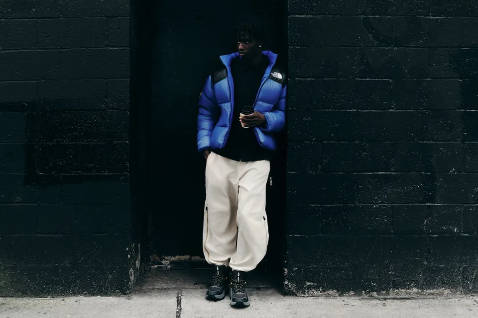 Gros plan sur la doudoune réversible Pertex Nuptse de The North Face