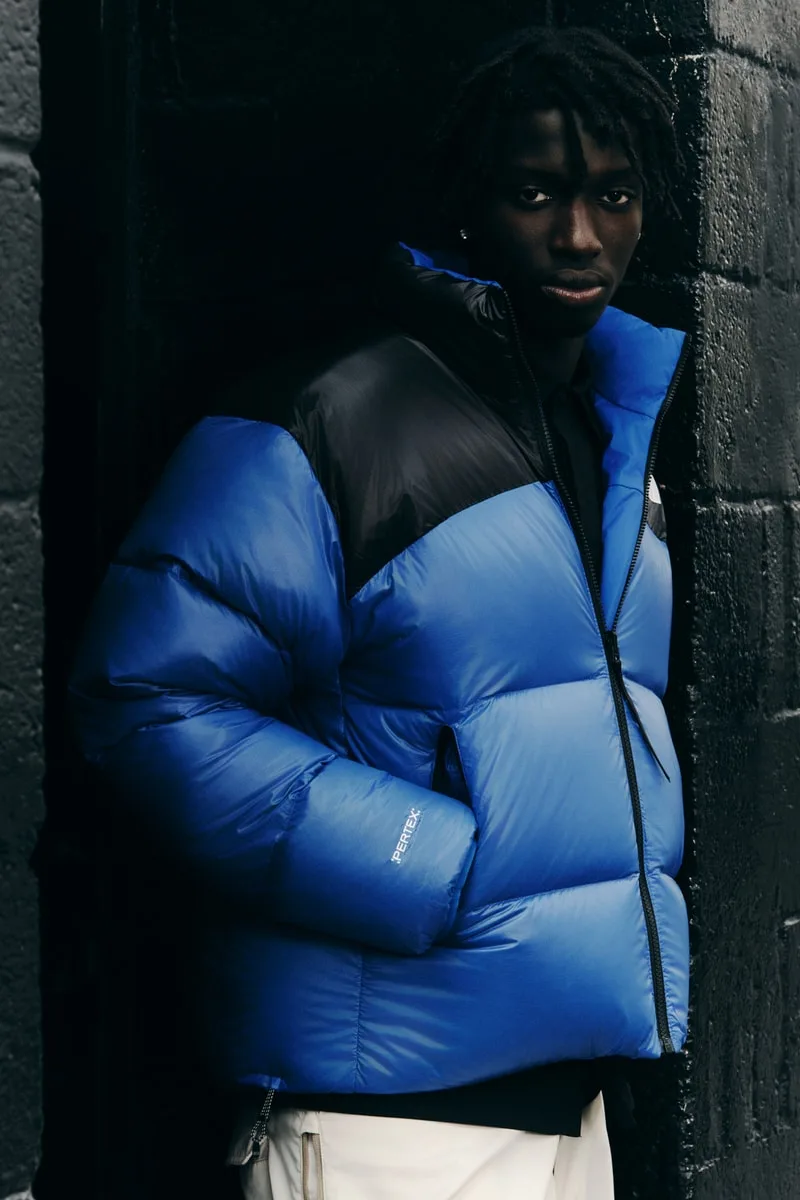 Gros plan sur la doudoune réversible Pertex Nuptse de The North Face