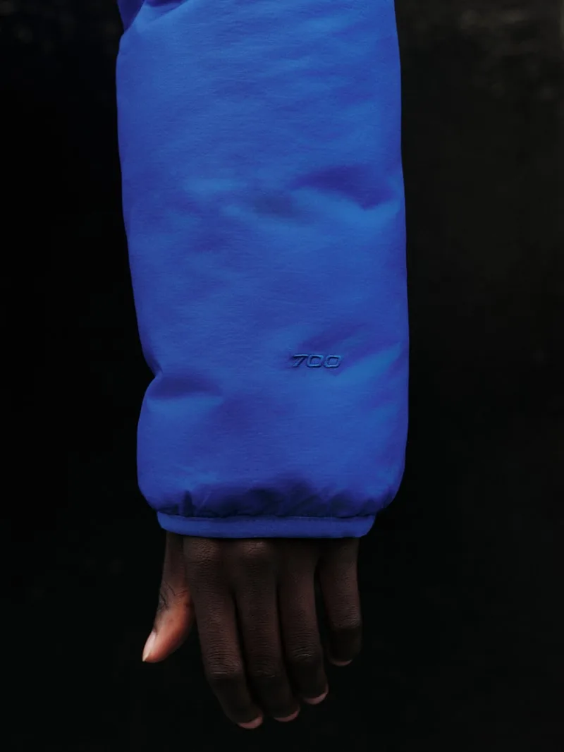Gros plan sur la doudoune réversible Pertex Nuptse de The North Face