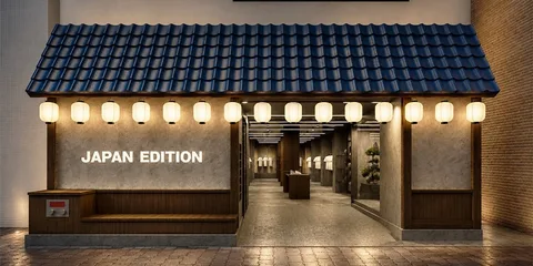 Entrée de bâtiment avec lanternes et toit bleu, texte 'Japan Edition'.