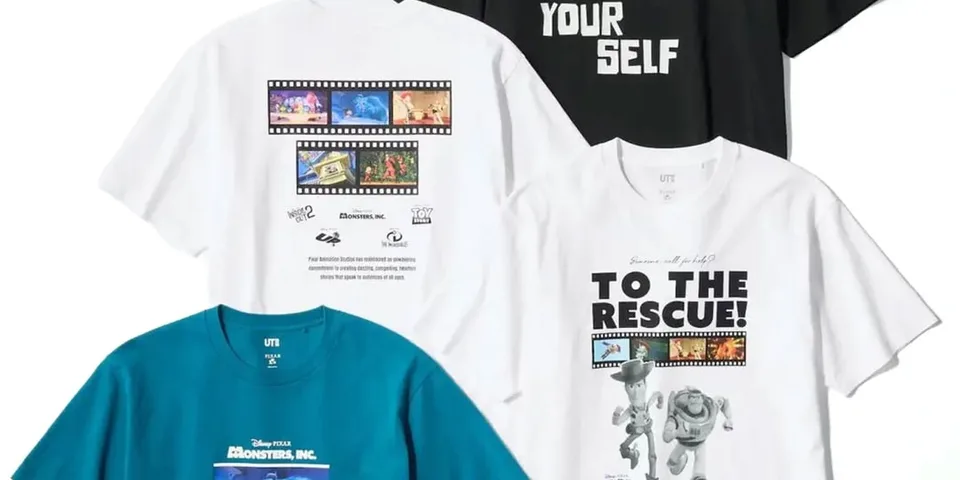 Quatre t-shirts graphiques colorés Pixar avec des motifs différents.