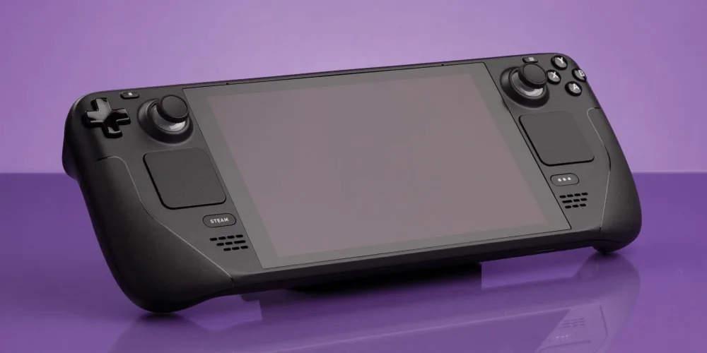 Console de jeu portable noire sur fond violet clair